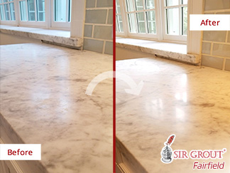 Before and after Picture of This Stone Honing Job Done in Ridgefield, CT, That Restored This Dulled Marble Countertops